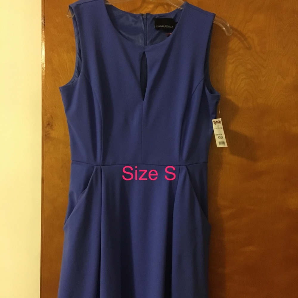 Blue dress with keyhole and pockets